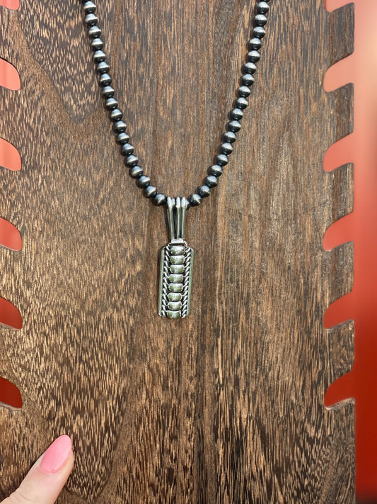 Navajo Handmade Silver Pendant